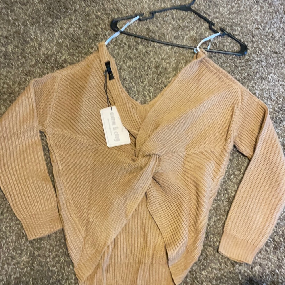 Size Medium light tan Sweater with tie in front